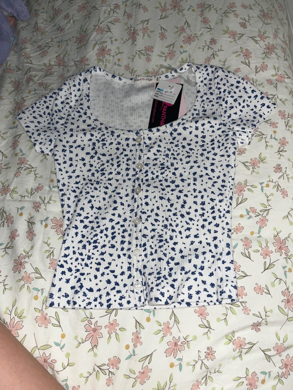 A crop top with flowers as a design on it!